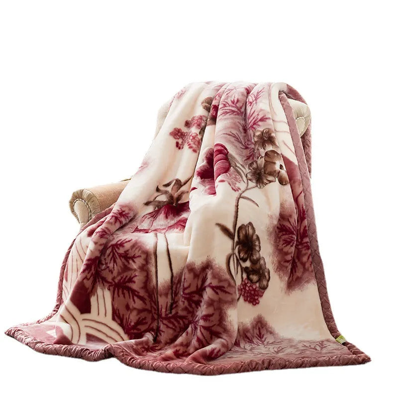 SilkenWarmth Raschel blanket, large floral motif, styled on bed